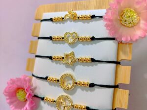 Pulseras Hilo Negro con Dije